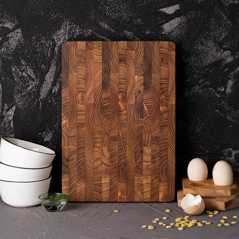 Wooden cutting board ideal for food prep, chopping, and serving.